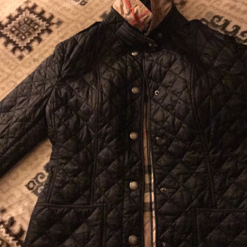 It’s a real Burberry black  jacket